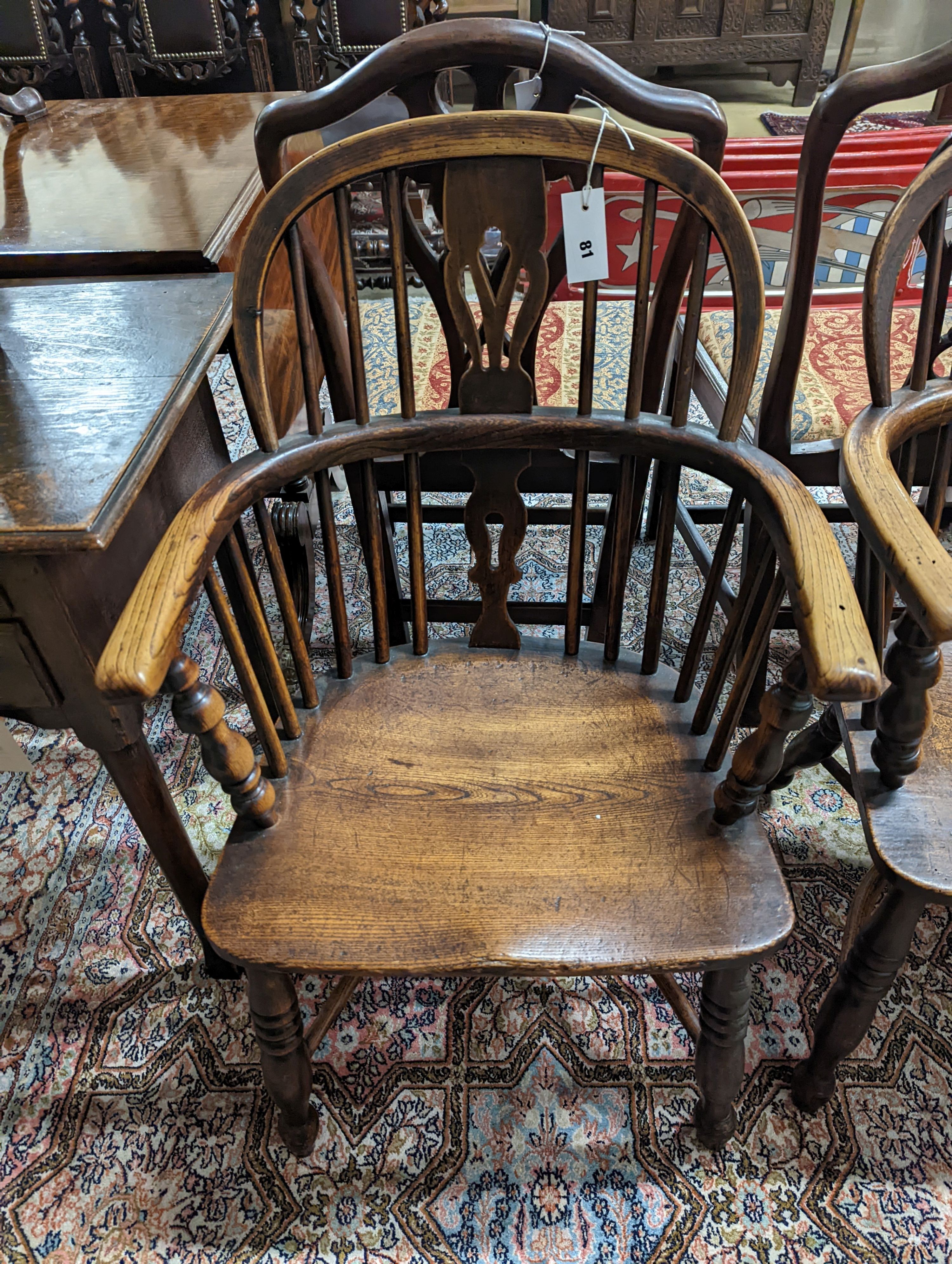 A pair of early 19th century ash and elm Windsor chairs. H-87cm.